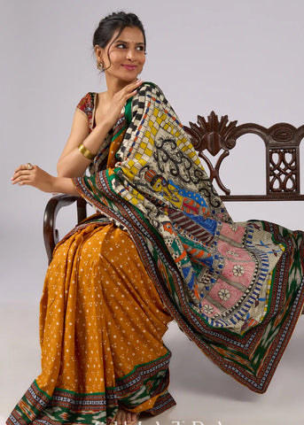 Yellow Bandhani print rayon saree with hand painted Madhubani art