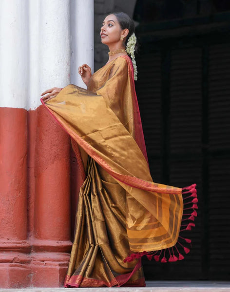 Dual-colored Gold Tissue Cotton Saree With Red Jacquard Border