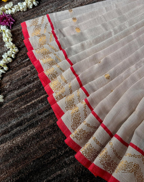 Off White Cotton Slub Saree With Jacquard Border & Tassels