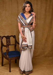 White Chinnon Saree with Blue Delicate Border