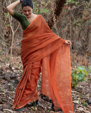 Striking Rust-hued Saree With Zari Detailing