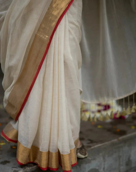 Lovely Cream Mul Zari Saree With Red And Gold Border