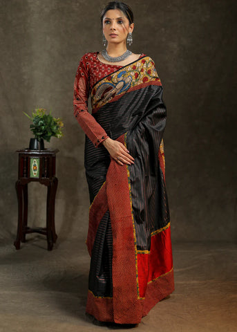 BLACK SAREE WITH BEAUTIFUL KALAMKARI AND IKKAT COMBINATION BORDER