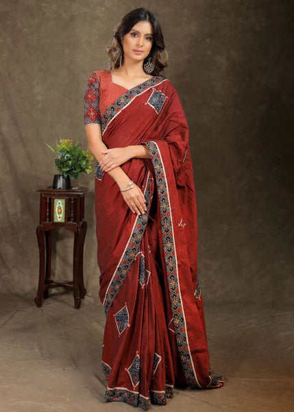 MAROON RAYON SAREE WITH AJRAKH APPLIQUE WORK AND BORDER