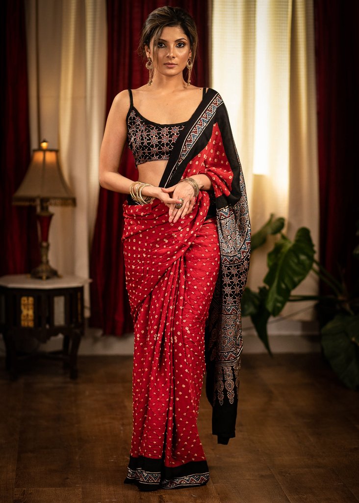 RED MODAL SILK BANDHEJ SAREE WITH AJRAKH PALLU AND BORDER