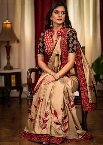 BEIGE SEMI SILK SAREE WITH HAND APPLIC WORK