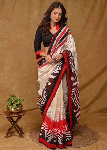 CREAM COTTON SAREE WITH BEAUTIFUL RED AND BLACK ALPANA PAINTING