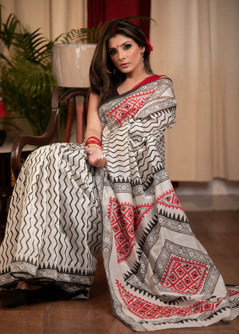 BLOCK PRINTED CHANDERI SAREE WITH HAND EMBROIDERED GUJARATI STITCH PALLU